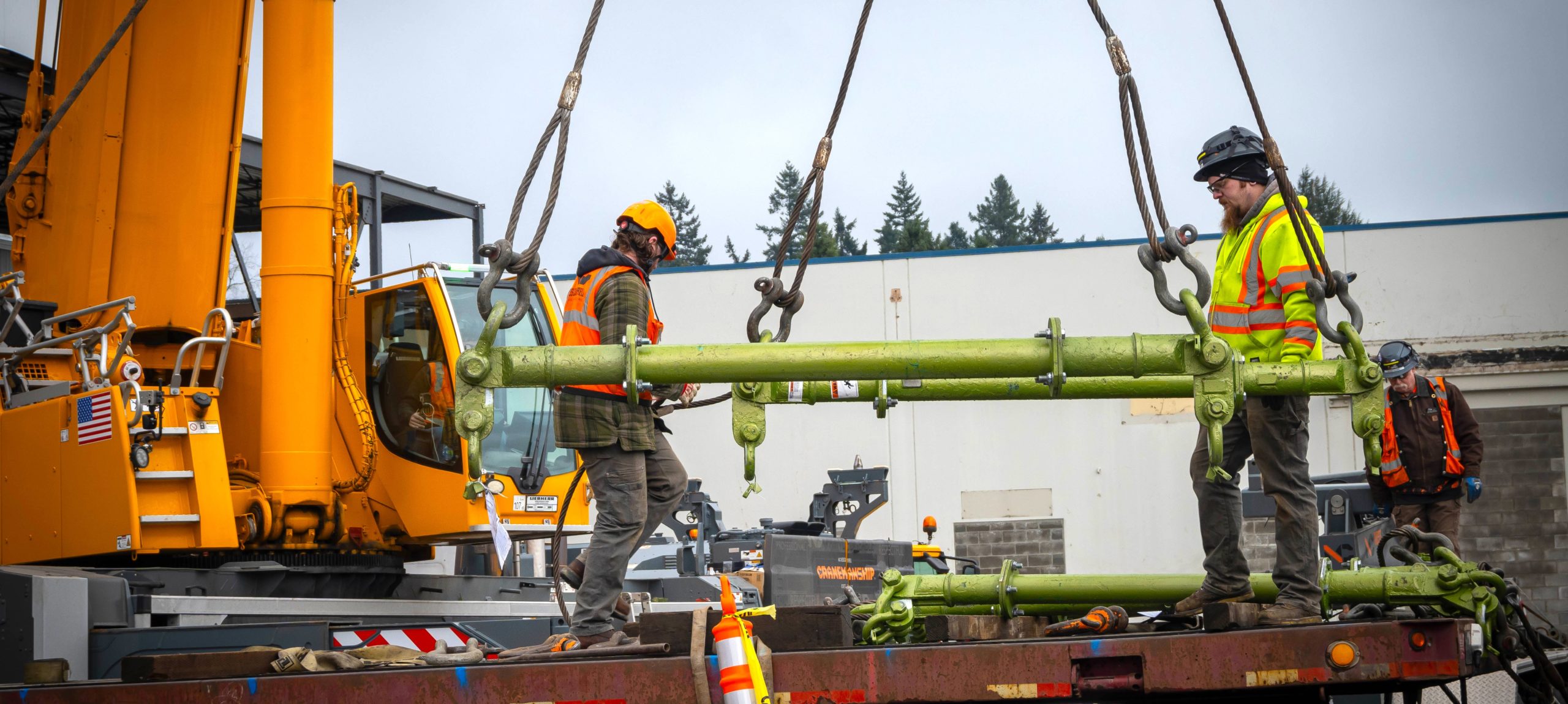 Construction workers from LGH and Ness Campbell case study, installing a CO2 chiller in Milwaukie, Oregon.